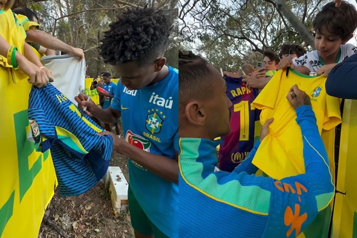 Jogadores da Seleção Brasileira distribuem fotos e autógrafos após treino