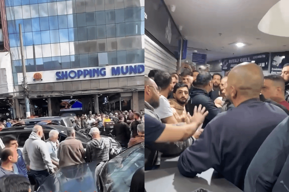 Policiais são encurralados por vendedores em operação na 25 de Março. Veja vídeo