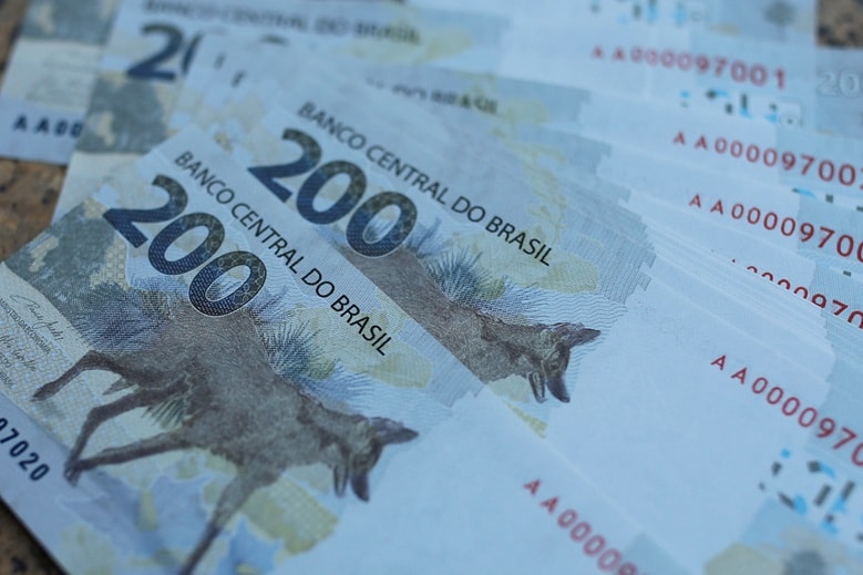 REAL11: novo ETF da XP combina rendimento da Selic e exposição ao real; entenda