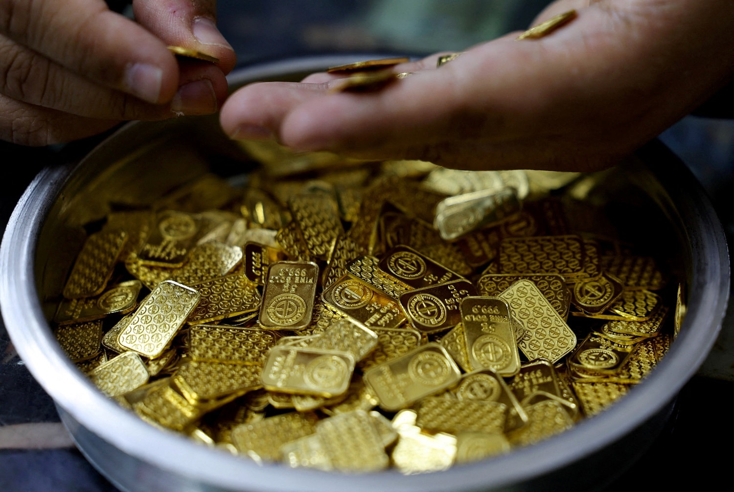 Ouro fecha em alta com acordo entre EUA e Irã aliviando pressões inflacionárias